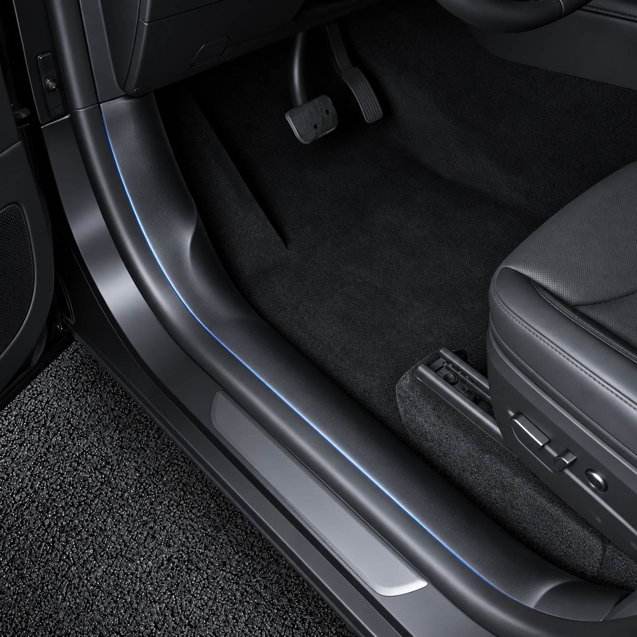 Black sill protection beside the driver seat