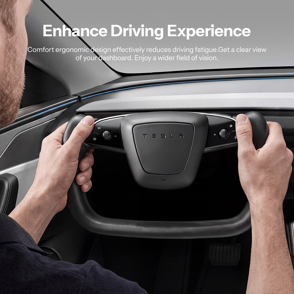 Clear view of Tesla dashboard through open-bottom yoke