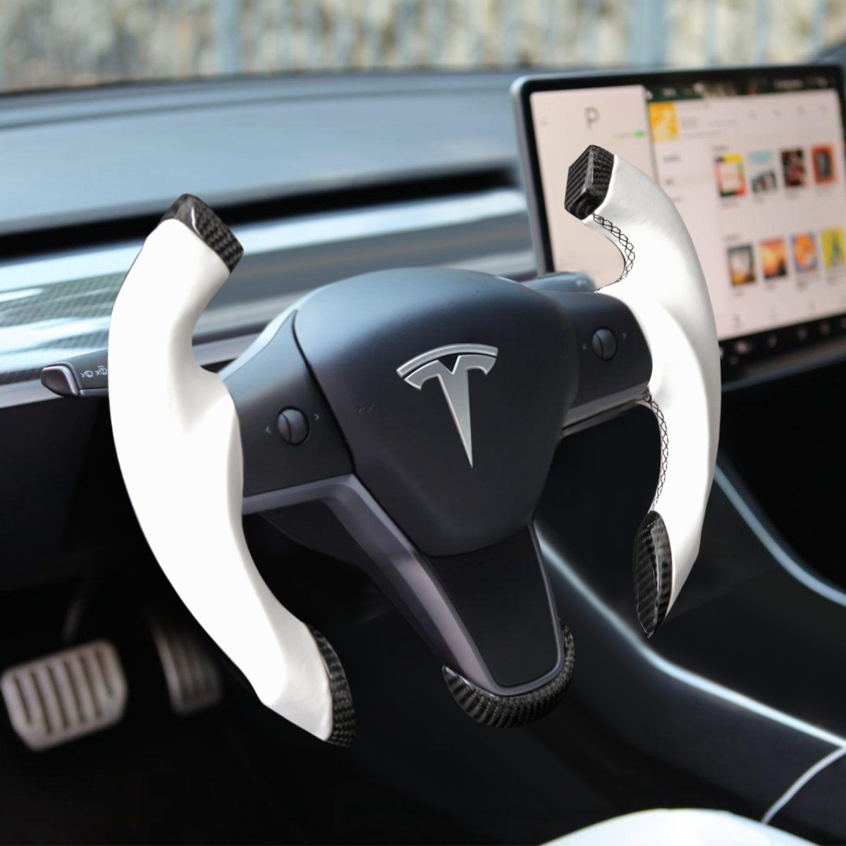 Open-top roadster steering wheel shape and carbon-fiber trim detail